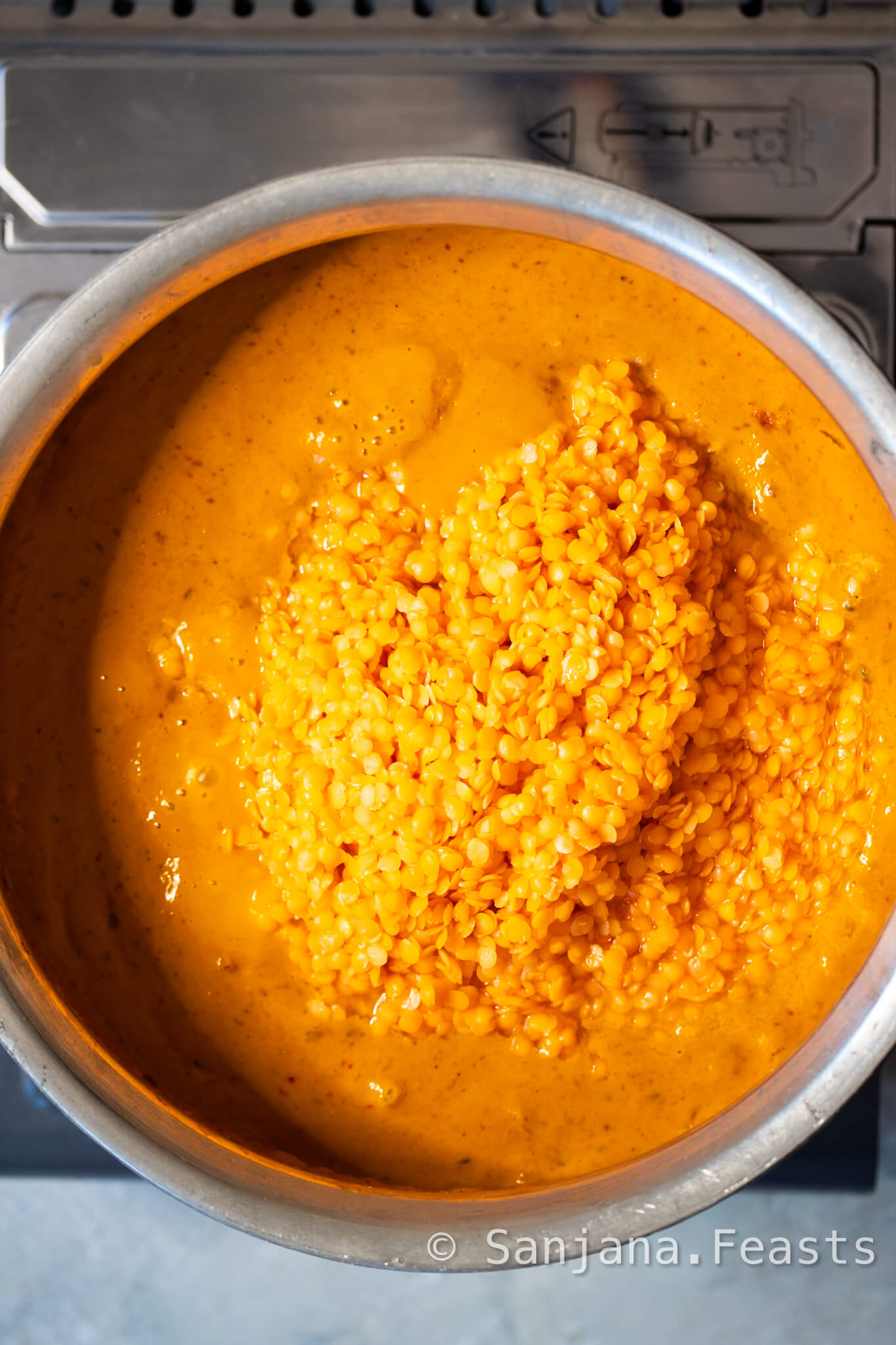 Add the red lentils to the curry sauce