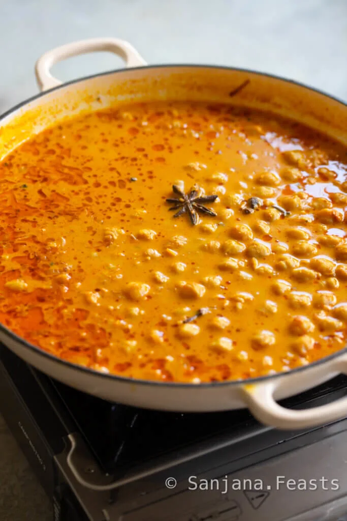 Simmer the chickpeas in the curry